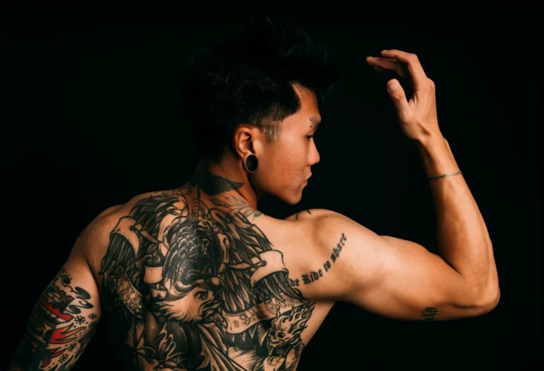 Blackwork across the back and upper arm