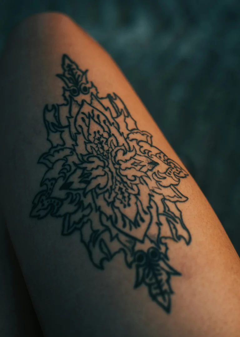 Large black flower on the upper arm