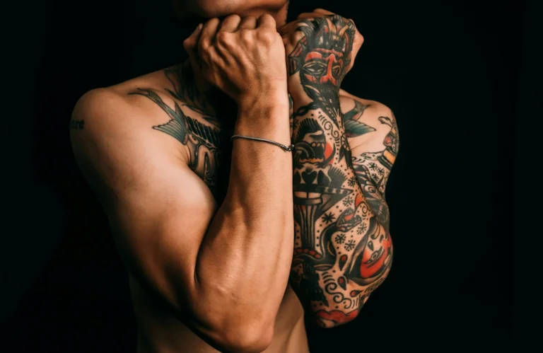 Fully tattooed arms and chest