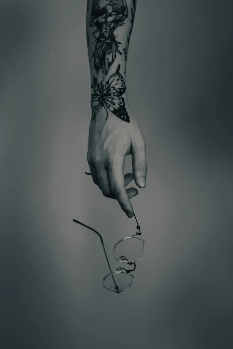 Detailed black and grey on a hand and forearm