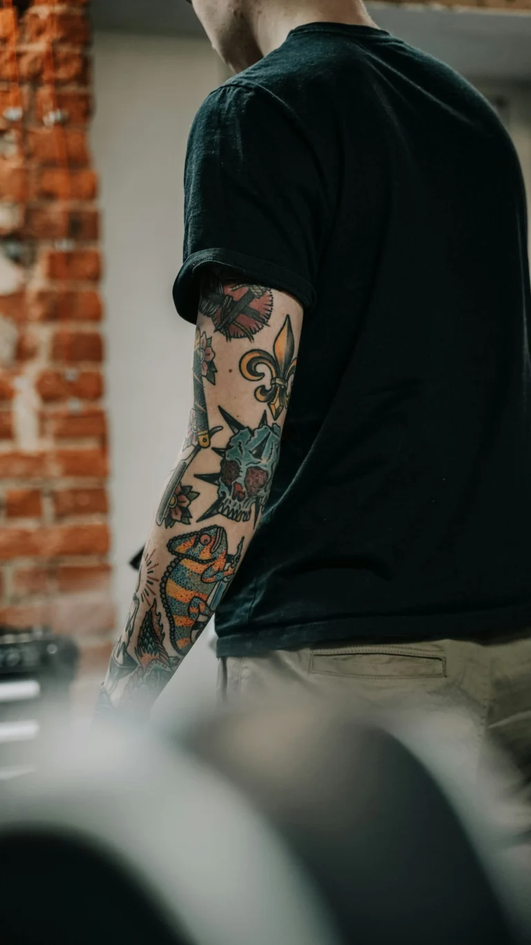 Black and grey sleeve on the upper arm