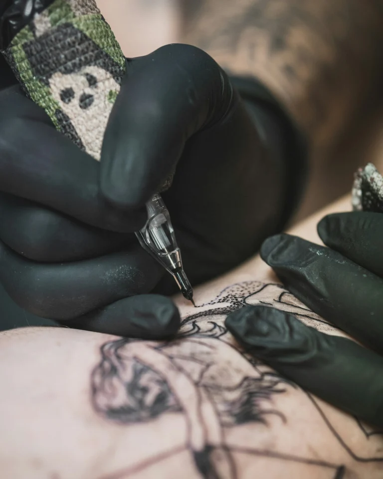 Blackwork character piece being tattooed